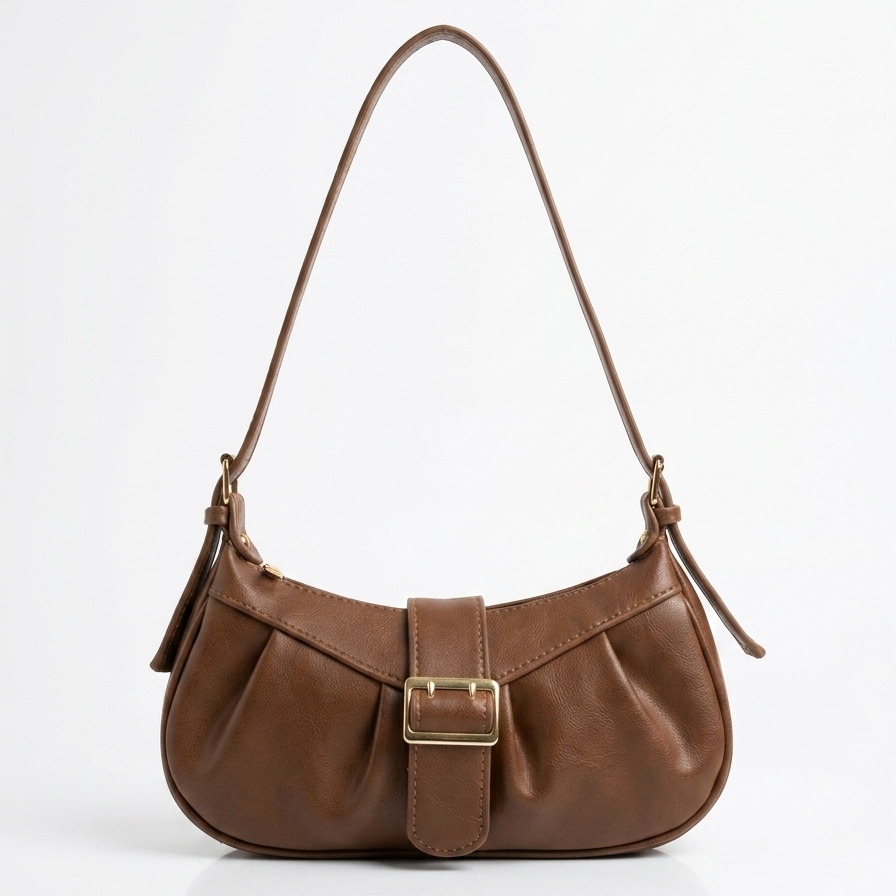 Lyana Brown pinterest handbag with a gold buckle on a white background
